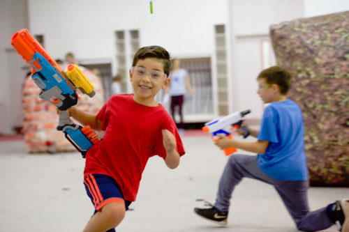 Host an action-packed Nerf birthday party with Kids Nerf Parties in the UK. Our parties feature exciting games and challenges to keep guests entertained at your local sports center. Book now for an unforgettable Nerf adventure! Know more: https://kidsnerfparties.co.uk/