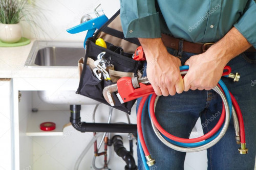 depositphotos_60569887-stock-photo-plumber-on-the-kitchen.jpg