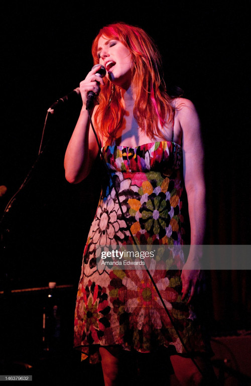 HOLLYWOOD, CA - JUNE 14:  Actress and singer Alicia Witt performs onstage at the release party for h